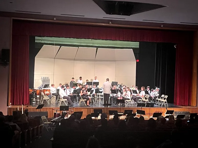 Weston orchestra performing at a school concert